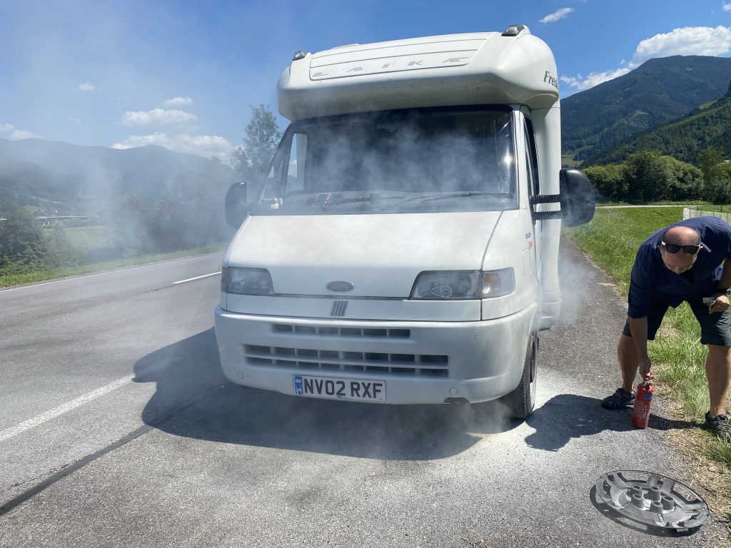 Van with brakes on fire