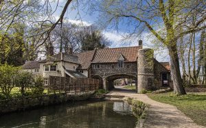 Pulls Ferry - Old water gate built in flint from 16th century overlooking water in Norwich